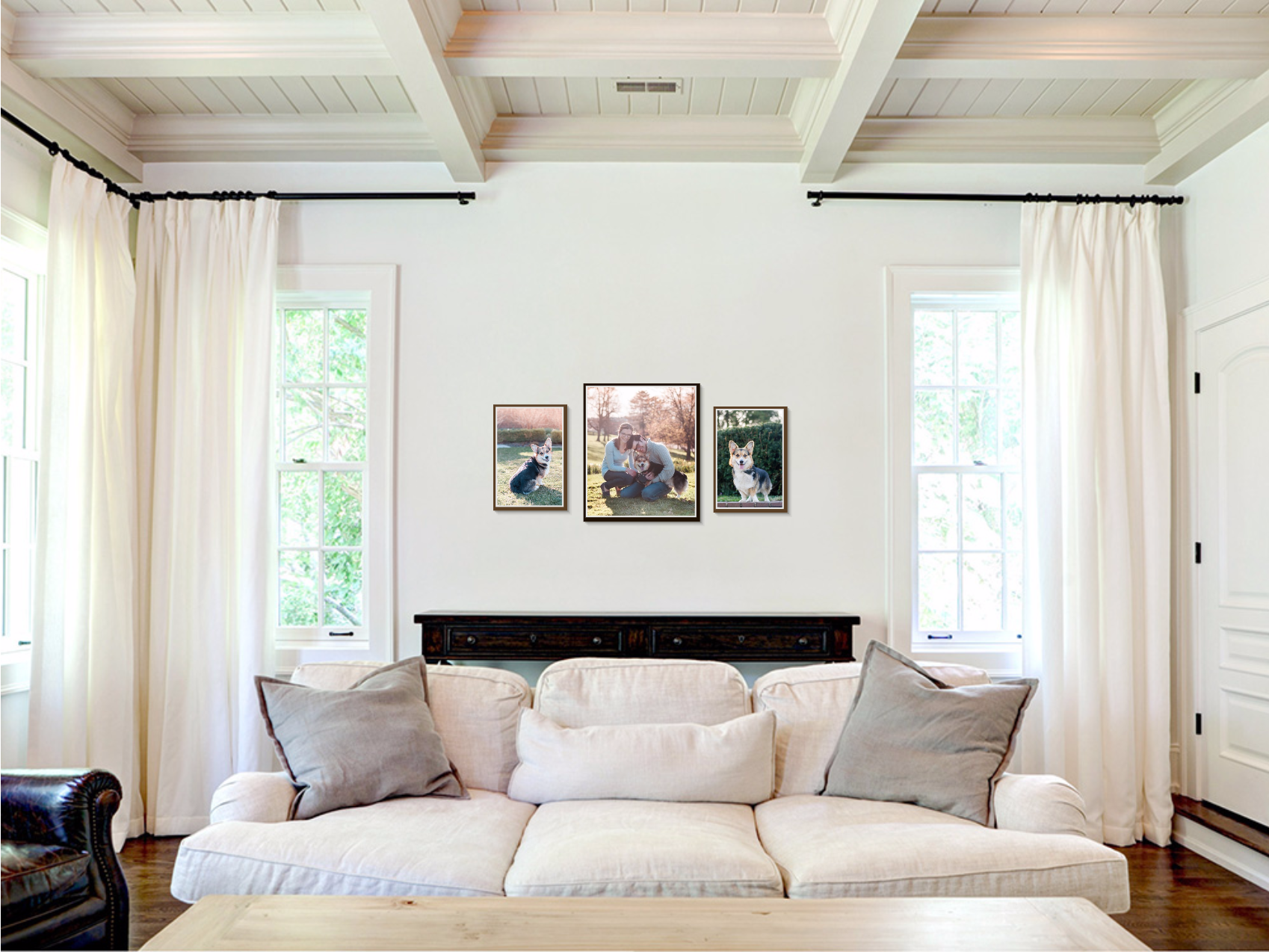 wall art grouping of corgi hanging above white sofa in living room